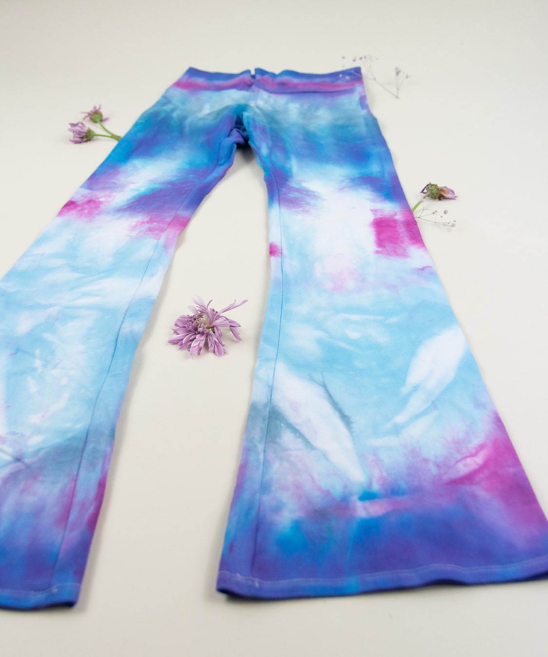 Purple and pink tie dye yoga pants with wide waistband by Akasha Sun.