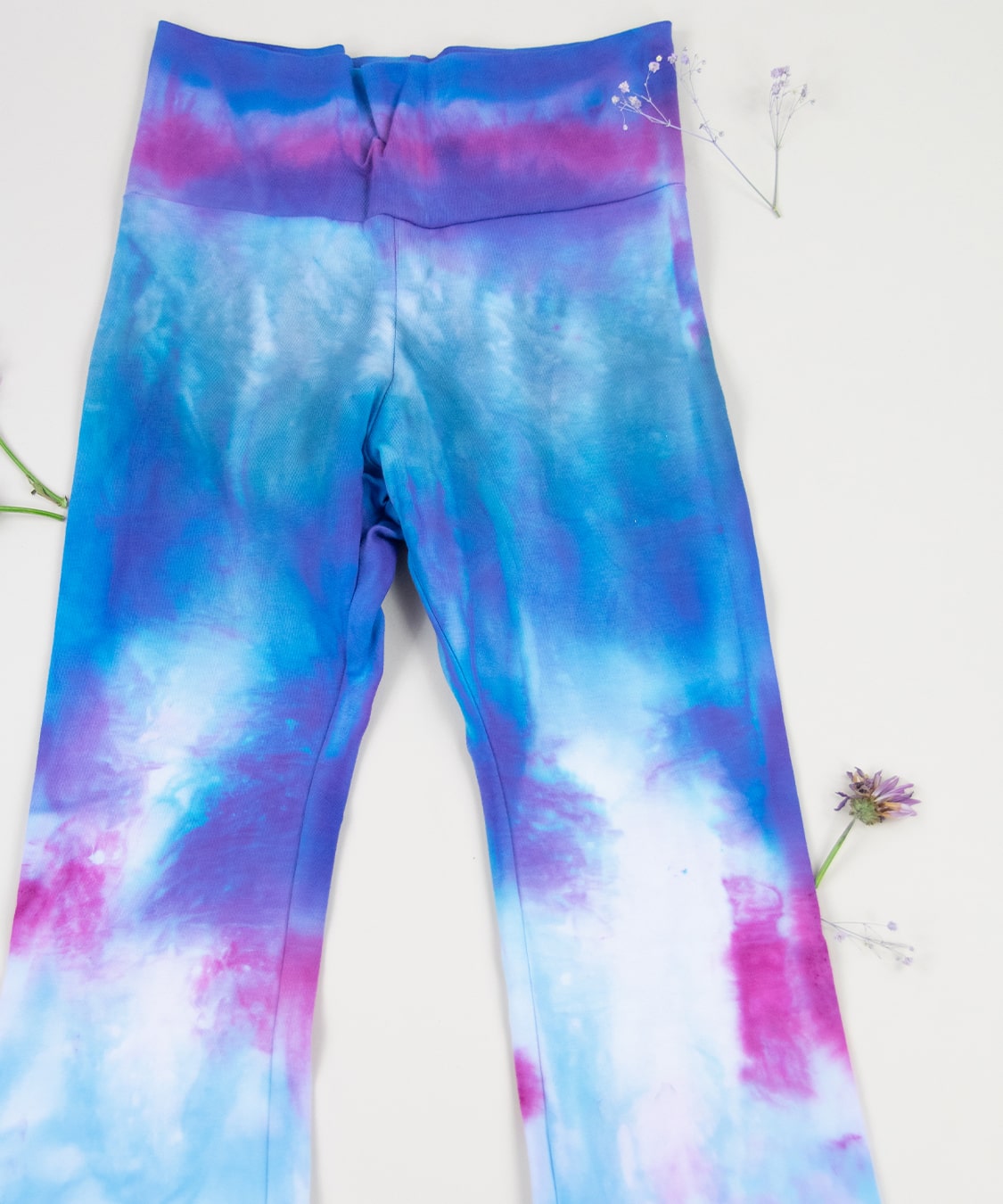 Purple and pink tie dye yoga pants with wide waistband by Akasha Sun.